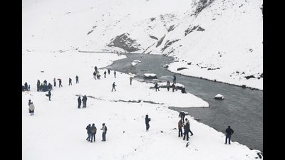Tourists enjoy after a fresh spell of snowfall during their visit to the Kashmir Valley, at Sonamarg on Friday. (ANI) Tourists enjoy after a fresh spell of snowfall during their visit to the Kashmir Valley, at Sonamarg on Friday. (ANI)