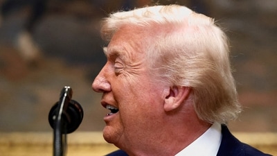A fake news report claiming Trump planned to wear a military uniform is circulating online, falsely attributed to Politico reporters (REUTERS)