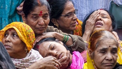 Family members of a victim, who died after consumption of contaminated water, mourn in the Bhagirathpura area of Indore, Madhya Pradesh (PTI) Family members of a victim, who died after consumption of contaminated water, mourn in the Bhagirathpura area of Indore, Madhya Pradesh (PTI)