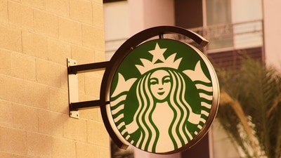 Starbucks launches its winter menu on January 6, featuring new and returning flavors inspired by caramel, pistachio, and the Dubai chocolate trend. (Representative Image: Unsplash) Starbucks launches its winter menu on January 6, featuring new and returning flavors inspired by caramel, pistachio, and the Dubai chocolate trend. (Representative Image: Unsplash)