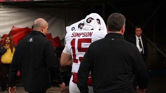 Ty Simpson #15 of the Alabama Crimson Tide walks to the locker room with an injury during the third quarter against the Indiana Hoosiers in the College Football Playoff Quarterfinal at Rose Bowl Stadium on January 01, 2026 in Pasadena, California. (Getty Images via AFP)