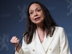 Maria Corina Machado supports US military intervention against Maduro's regime, calling for popular sovereignty and the release of political prisoners.