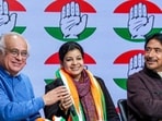 Congress general secretaries Jairam Ramesh (L) and Ghulam Ahmad Mir (R) with TMC Rajya Sabha MP Mausam Noor as she joins the Congress at the party headquarters in New Delhi on Saturday, January 3, 2026.
