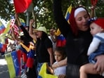 People celebrate following a U.S. strike on Venezuela where President Nicolas Maduro and his wife, Cilia Flores, were captured, in Santiago, Chile January 3, 2026. 