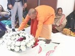 Uttar Pradesh CM Yogi Adityanath paying tribute to the late BJP MLA Shyam Bihari Lal in Bareilly on January 3. (HT photo)