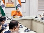 Uttar Pradesh chief minister Yogi Adityanath chairs a review meeting of the state finance department on Friday. (ANI PHOTO)