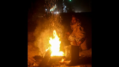 A local resorts to a makeshift fire on Saturday morning, as Gurugram witnesses one of the coldest days of this season. (PTI) A local resorts to a makeshift fire on Saturday morning, as Gurugram witnesses one of the coldest days of this season. (PTI)
