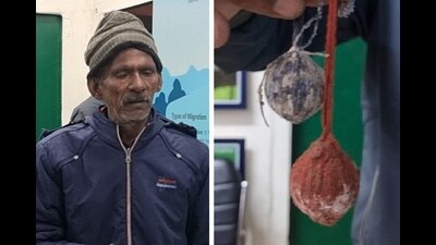 Om Prakash under arrest and (right) explosive balls seized from him (HT Photos) Om Prakash under arrest and (right) explosive balls seized from him (HT Photos)