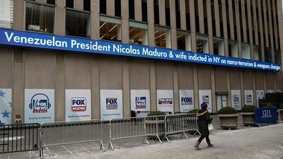 Fox News headlines display news about the US military's capture of Venezuelan President Nicolas Maduro, on the outside of the News Corp building in New York City on January 3, 2026. (AFP)