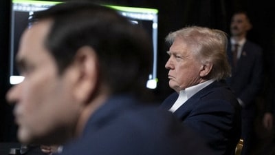 A photograph posted by U.S. President Donald Trump on his Truth Social account shows him sitting next to U.S. Secretary of State Marco Rubio as they watch the U.S. military operation in Venezuela from Trump's Mar a Lago resort, in Palm Beach, Florida, U.S., January 3, 2026. (REUTERS)
