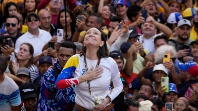Venezuelan opposition leader Maria Corina Machado addresses supporters at a protest against President Nicolas Maduro in Caracas, Venezuela, in January 2025, a day ahead of Maduro's inauguration ceremony, where he was sworn in for a third term. (AP File) Venezuelan opposition leader Maria Corina Machado addresses supporters at a protest against President Nicolas Maduro in Caracas, Venezuela, in January 2025, a day ahead of Maduro's inauguration ceremony, where he was sworn in for a third term. (AP File)