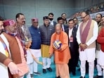 Chief minister Yogi Adityanath, deputy CM Brajesh Pathak and others during the inauguration ceremony of the 72nd Senior National Volleyball Championship in Varanasi on Sunday. (HT)