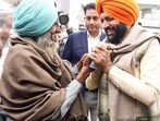 Haryana CM Saini with a farmer during his visit to a grain market of Ghanaur in Patiala on Sunday (ANI) Haryana CM Saini with a farmer during his visit to a grain market of Ghanaur in Patiala on Sunday (ANI)