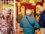 Police personnel at the site where Jarmal Singh, an Aam Aadmi Party (AAP) leader and village sarpanch, was allegedly shot dead while attending a wedding, in Amritsar, on Sunday. (PTI)