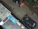 The 36-second video purportedly shows a man carrying a rod breaking the windshield of a parked car outside the girls’ PG while verbally abusing the PG owner. (Video grab/HT Photo)