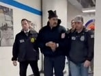 Image from video posted by the White House's Rapid Response 47 account on X showing Venezuela's President Nicolas Maduro being walked in custody down a hallway at the offices of the U.S. Drug Enforcement Administration (DEA) in New York City.