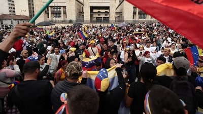 Venezuelans celebrate in Bogotá, Colombia, Saturday, Jan. 3, 2026, after U.S. President Donald Trump announced that U.S. forces had captured Venezuelan President Nicolás Maduro. (AP/PTI) (AP01_04_2026_000017A) (AP) Venezuelans celebrate in Bogotá, Colombia, Saturday, Jan. 3, 2026, after U.S. President Donald Trump announced that U.S. forces had captured Venezuelan President Nicolás Maduro. (AP/PTI) (AP01_04_2026_000017A) (AP)