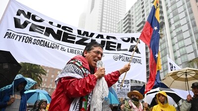 Protesters denounce the U.S. attack on Venezuela, Saturday, Jan. 3, 2026, at Pershing Square in Los Angeles.&nbsp; (AP)