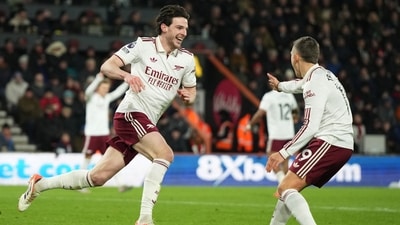 Arsenal's Declan Rice, left, celebrates with Arsenal's Leandro Trossard after scoring his sides third goal. (AP)