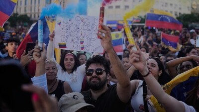 Venezuelans celebrate at the Obelisk in Buenos Aires, Argentina, Saturday, Jan. 3, 2026, after U.S. President Donald Trump announced that President Nicolas Maduro had been captured and flown out of Venezuela. (AP Photo/Natacha Pisarenko) (AP) Venezuelans celebrate at the Obelisk in Buenos Aires, Argentina, Saturday, Jan. 3, 2026, after U.S. President Donald Trump announced that President Nicolas Maduro had been captured and flown out of Venezuela. (AP Photo/Natacha Pisarenko) (AP)