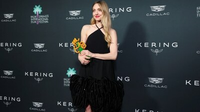Amanda Seyfried is pictured with the Desert Palm Achievement Award. REUTERS/Mario Anzuoni (REUTERS)