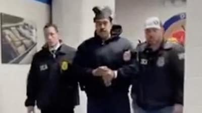 Nicolas Maduro is perp walked by DEA agents inside the headquarters of the US Drug Enforcement Administration (DEA) in lower Manhattan, New York, on January 3. (AFP) (HT_PRINT) Nicolas Maduro is perp walked by DEA agents inside the headquarters of the US Drug Enforcement Administration (DEA) in lower Manhattan, New York, on January 3. (AFP) (HT_PRINT)