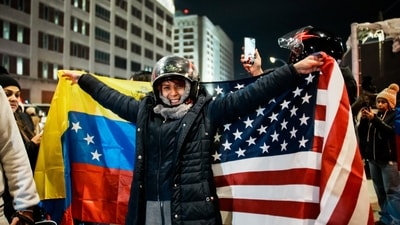 A person reacts holding Venezuelan and U.S. flags as Venezuelan immigrants celebrate after the United States struck Venezuela and captured its President Nicolas Maduro and his wife Cilia Flores, and they were brought to the Metropolitan Detention Center in Brooklyn (MDC Brooklyn), in New York City, U.S., January 3, 2026. (REUTERS)