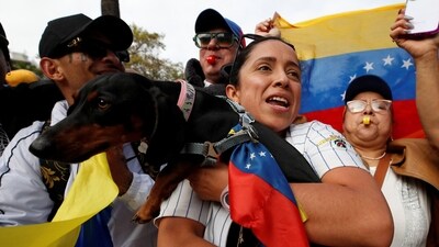 Venezuelans celebrate after U.S. President Donald Trump said the U.S. has struck Venezuela and captured its President Nicolas Maduro and his wife Cilia Flores, in Vina del Mar, Chile, January 3, 2026. (REUTERS/Rodrigo Garrido) (REUTERS)