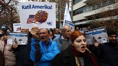 People take part in a protest, a day after U.S. President Donald Trump said the U.S. has struck Venezuela and captured its President Nicolas Maduro and his wife Cilia Flores, in downtown Ankara, Turkey, January 4, 2026. The placard reads: "Murderer America", referring the U.S.  REUTERS/Efekan Akyuz (REUTERS)