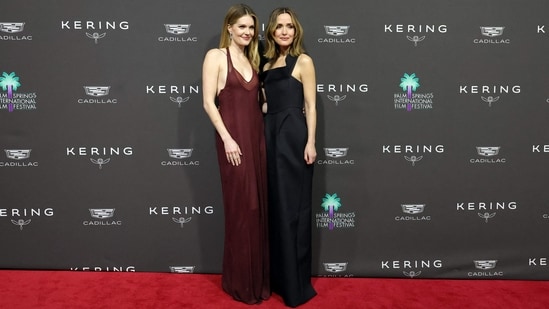 Meghann Fahy and Rose Byrne pose together at the 37th Annual Palm Springs International Film Festival. (Photo by KEVIN WINTER / GETTY IMAGES NORTH AMERICA / Getty Images via AFP)(Getty Images via AFP)