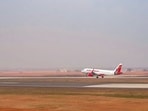An airplane during the validation flight conduction at the Bhogapuram International Airport, in Visakhapatnam, Andhra Pradesh, on Sunday. (@RamMNK)