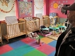 ABC Learning Center director Ahmed Hasan stands in the infant room at his daycare center, in Minneapolis, Minn., on Wednesday, Dec. 31, 2025. (AP Photo/Mark Vancleave) ABC Learning Center director Ahmed Hasan stands in the infant room at his daycare center, in Minneapolis, Minn., on Wednesday, Dec. 31, 2025. (AP Photo/Mark Vancleave)