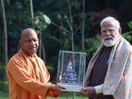 UP CM Yogi Adityanath presented a replica of Ram temple with pink minakari (pink enamelling) to the PM. (Sourced)