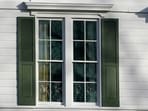 Damaged window panes at the East Walnut Hills home of U.S. Vice President JD Vance in Cincinnati, Ohio, U.S., January 5, 2026. 