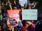 Members of the militia group known as "Colectivos" take part in a march calling for the release of Venezuela's President Nicolas Maduro.