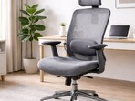 An office chair for home setups showing a headrest and lumbar design that supports a relaxed posture during extended desk hours comfortably.(AI generated)