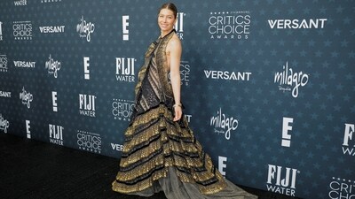 Jessica Biel looked super elegant in a Lanvin halter gown featuring a backless design, a tiered silhouette, a mesh and lace design, and an abundance of gold sequins. She completed the look with a collection of Cartier jewels in yellow and white gold, embellished with diamonds.&nbsp; (REUTERS)