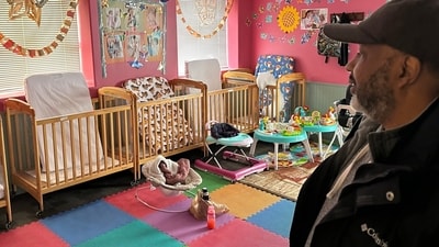 ABC Learning Center director Ahmed Hasan stands in the infant room at his daycare center, in Minneapolis, Minn., on Wednesday, Dec. 31, 2025. (AP Photo/Mark Vancleave) (AP) ABC Learning Center director Ahmed Hasan stands in the infant room at his daycare center, in Minneapolis, Minn., on Wednesday, Dec. 31, 2025. (AP Photo/Mark Vancleave) (AP)