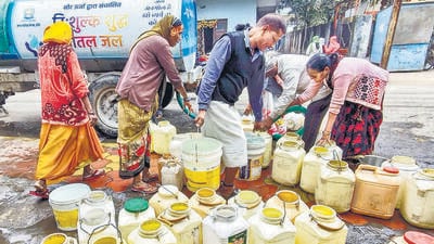 People fill water from a tanker in the aftermath of deaths due to consumption of allegedly contaminated water, in the Bhagirathpura area of Indore, Madhya Pradesh on Monday. (PTI) People fill water from a tanker in the aftermath of deaths due to consumption of allegedly contaminated water, in the Bhagirathpura area of Indore, Madhya Pradesh on Monday. (PTI)