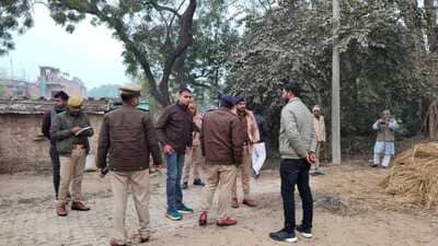 Police and a forensic team at the spot of the incident in Lokpur village in Mauaima area of Prayagraj. (HT Photo) Police and a forensic team at the spot of the incident in Lokpur village in Mauaima area of Prayagraj. (HT Photo)