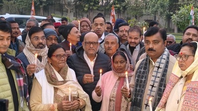 UP Congress Committee president Ajay Rai and other party workers held candlelight vigil on Monday. (HT Photo)