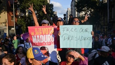 Members of the militia group known as "Colectivos" take part in a march calling for the release of Venezuela's President Nicolas Maduro in Caracas, Venezuela. (REUTERS)