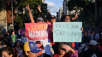 Members of the militia group known as "Colectivos" take part in a march calling for the release of Venezuela's President Nicolas Maduro, after he and his wife Cilia Flores were captured following U.S. strikes on Venezuela, in Caracas, Venezuela, January 4, 2026. REUTERS/Gaby Oraa (REUTERS)