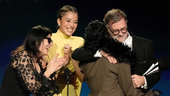 From left, Cassandra Kulukundis, Chase Infiniti, Teyana Taylor, and Paul Thomas Anderson accept the award for best picture for "One Battle After Another" during the 31st Annual Critics Choice Awards on Sunday, Jan. 4, 2026, at The Barker Hanger in Santa Monica, Calif. (AP Photo/Chris Pizzello)(Chris Pizzello/Invision/AP)
