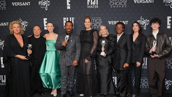 Hannah Walters, from left, Stephen Graham, winner of the award for best actor in a limited series or movie made for television for "Adolescence," Erin Doherty, winner of the award for best supporting actress in a limited series or movie made for television for "Adolescence," Ashley Walters, Emily Feller, Christine Tremarco, Nina Wolarsky, Owen Cooper, winner of the award for best supporting actor in a limited series or movie made for television for "Adolescence," pose with the award for best limited series or movie made for television for "Adolescence" in the press room during the 31st Annual Critics Choice Awards on Sunday, Jan. 4, 2026, at The Barker Hanger in Santa Monica, Calif. (Photo by Jordan Strauss/Invision/AP)(Jordan Strauss/Invision/AP)