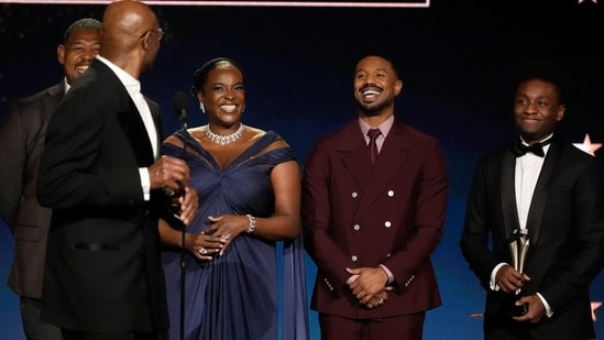 Omar Benson Miller, from left, Delroy Lindo, Wunmi Mosaku, Michael B. Jordan, and Miles Caton accept the award for best casting and ensemble for "Sinners" during the 31st Annual Critics Choice Awards on Sunday, Jan. 4, 2026, at The Barker Hanger in Santa Monica, Calif. (AP Photo/Chris Pizzello)(Chris Pizzello/Invision/AP)