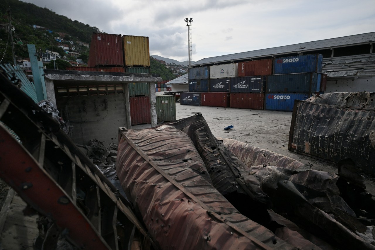 Burnt containers at the Port of La Guaira, Venezuela, on Saturday after a U.S. strike on the South American country. Burnt containers at the Port of La Guaira, Venezuela, on Saturday after a U.S. strike on the South American country.