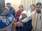 Jamshed alias Munna reunites with his mother Zarina Khatun in Araria on Tuesday. Munna was allegedly trafficked by Human trafficking racket in 2012 and sent to Myanmar. (HT Photo)