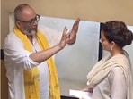 In the video, Kangana is seen dressed in a light-coloured suit.