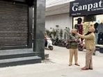 Neighbours told the police that they saw a group of masked men gathering outside the house, pelting stones and firing before fleeing from the spot. (HT Photo)